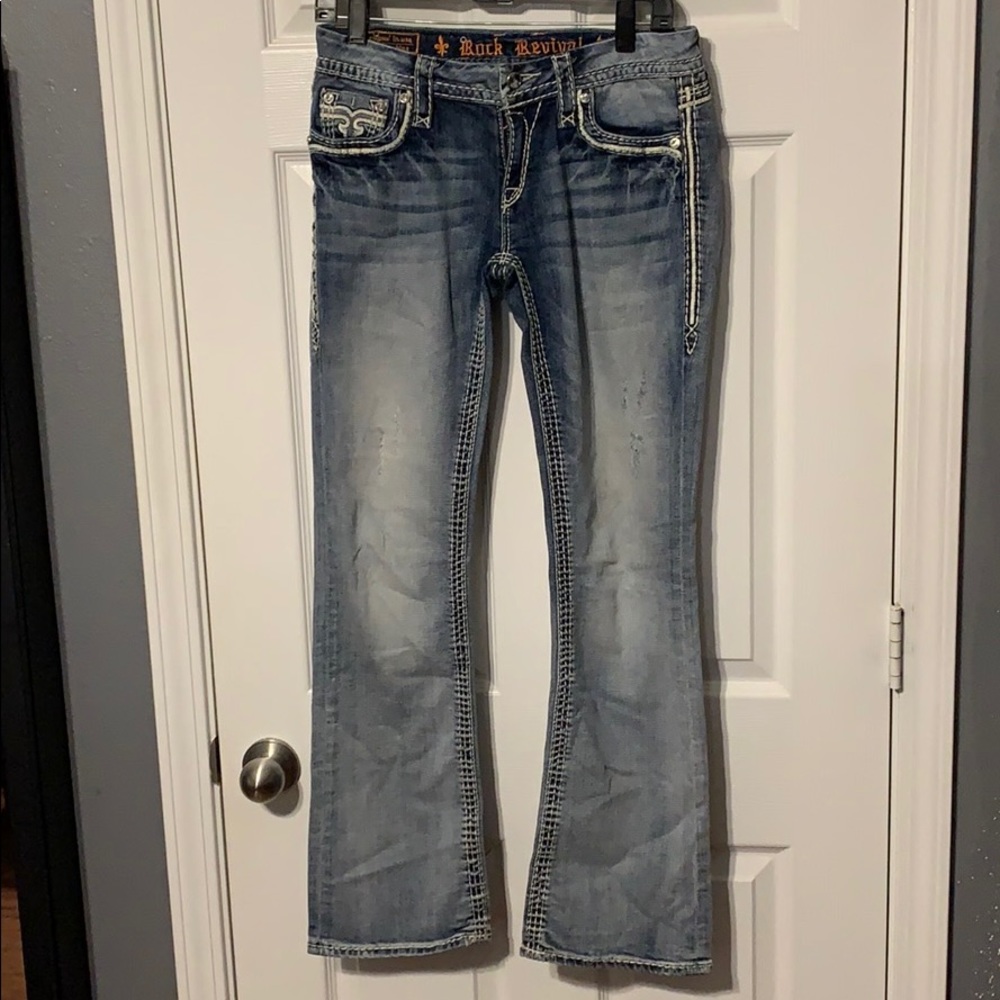 Like new rock revival studded jeans boot cut style